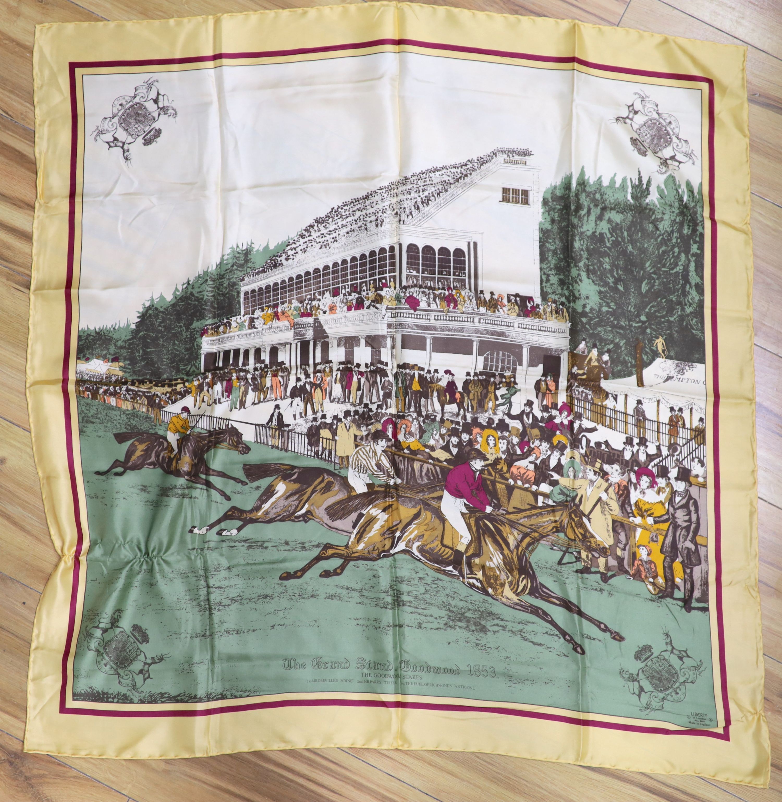 A Liberty silk scarf with a printed horse racing scene, with slip case